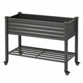 Jardinière surélevée 120 x 60 x 100 cm en acier noir avec roulettes et tablette de rangement